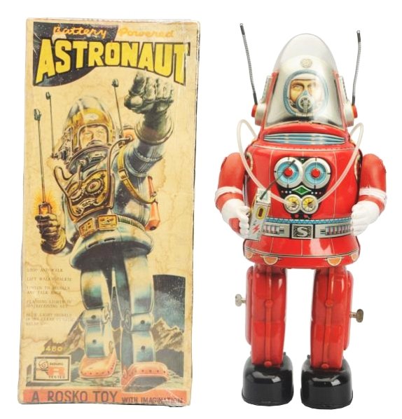 Tin Litho Battery Op. Rostro Astronaut Robot.: Red Version. Made in Japan. Working. Has box. Has some discoloration and paint loss to the inside of one battery box. Light crazing and scratching throughout. Box has staining and fading throughout, S