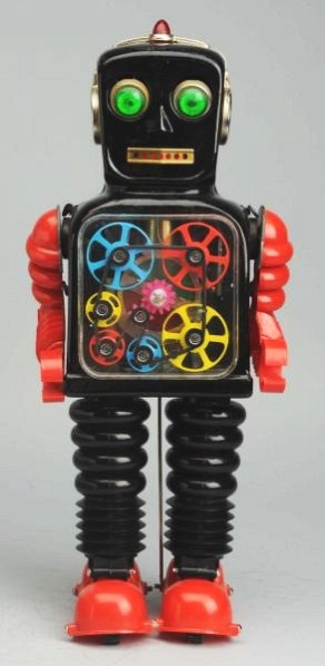 Tin Painted & Plastic Wheel-A-Gear Robot.: Battery operated. Made in Japan. By Tiyao. Works but has some minor problems. Drive belt to six colored gears slips. Does have box. Toy has some crazing on the back of the head and a small amount to t