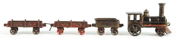 Early Cast Iron Freight Train Set American Made.: Includes American style engine with molded cowcatcher. Four wheel tender and two Lehigh Valley Road flat cars marked L.V.R.R. Wheels of the flat cars look like they have some repaint. Engine has signi