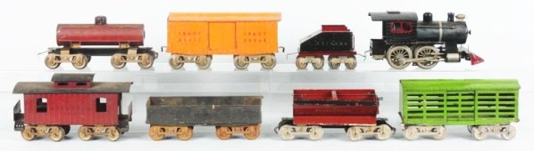 Lionel Standard Gauge No.5 Freight Train Set.: Pre-war. Includes No.5 engine with matching New York Central and Hudson River Railroad tender. Early 20th century. Steam type engine has one band. Engine and tender both have some repainting and comes