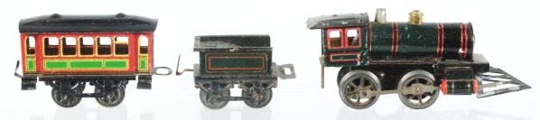 German KBN Clockwork O-gauge Passenger Train Set.: Includes American style steam type engine missing front stack. Matching four wheel tender and four wheel lithographed passenger car. Some scratching and wear. Condition (Very Good).