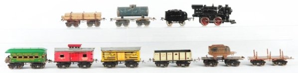 Lot of 11: Misc. Ives Train Items.: O gauge. Pre-war. Includes rubber stamp No.19 Steam type engine. Matching New York Central tender and there are eight freight cars. A tender shell and one No.68 observation passenger car. Tender shell