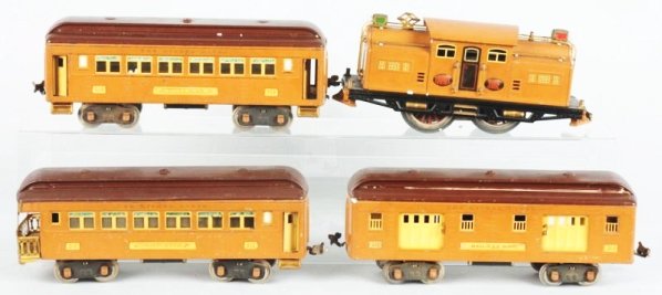 Lionel Standard Gauge No.318E Passenger Train Set: Pre-war. Includes electric style No.318E engine and three passenger cars in two tone baby state brown. Includes three No.309 pullman car, No.310 railway mail car and a No.312 observation car. Set has 