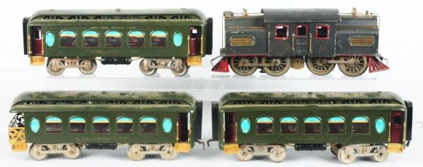 Lionel No.42 Passenger Train Set.: Standard gauge. Includes No.42 New York Central Lines electric style engine with three passenger cars. Two No.18 parlor car, and a No.190 observation car. Engine has some scratching and paint loss esp
