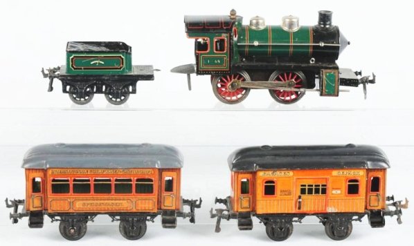 Bing 1Gauge Clockwork Passenger Train Set.: Pre-war. Includes European style engine marked 1=48. A matching four wheel tender marked GBN and underneath that Bovaria. Two wood grain passenger cars. There is a Speise Wagen and a baggage car. Cars