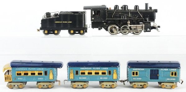American Flyer Passenger Train Set.: O gauge. Pre-war. Includes Steam type engine with matching American Flyer Lines sloped back tender and three passenger cars. A No.3150 baggage, No.3151 passenger and a No.3152 observation. Minor to mo