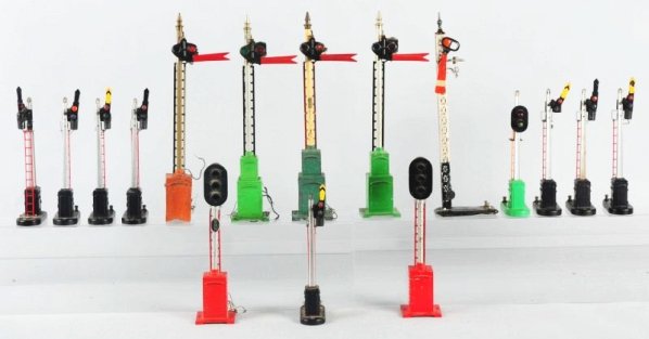 Lot of Assorted Railroad Signals.: Lionel No.99N block signal has scratches and paint chips needs bulb. Bing manually operated semi four missing parts. No.151 semi four has some paint chips. No.151 missing yellow paint on flag. No.151