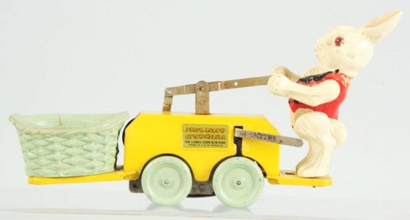 Lionel Peter Rabbit Chick-Mobile Toy.: Scarce floor variation. Solid disk floor wheels. Rabbit has both original eyes. Some oxidation to bare metal parts and some crazing and wear to basket and rabbit. Condition (Very Good - Excellent). Si