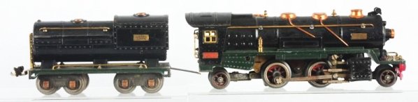 Lionel Steam Engine with Tender.: Lionel No 260E Steam locomotive and tender. Is complete and all original has some scratches and paint chips. Tender complete and all original has scratches and paint chips. Condition (Very Good).