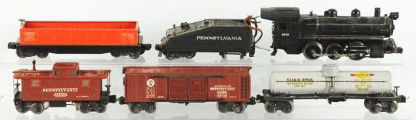 Lionel No.701 Semi-Scale Freight Train Set: O-Gauge Switcher freight train set. Circa 1939-1942. Pre-war. Includes a No.8976 semi-scale switcher with matching No.2227B slope back tender. A No.2812X Gondola car, a No.2755 Sunoco tank car, a No.2