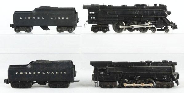 Lot of 2: Lionel Engines with Tenders & 3 Boxes.: No.671 Steam locomotive with 1947 style smoke unit. Complete and all original does have paint chip on cab roof. Very attractive. No.2671W Whistle tender PRR has scratches and paint chips throughout ha