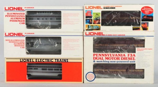 Lionel Pennsylvania Passenger Car Train Set.: O-Gauge. All with individual boxes. Includes Pennsylvania F-3A Dual mode motor diesel set with matching F-3B Dummy unit, and eight cars. Cars are all marked "Penn Aluminum". Passenger cars include, Th