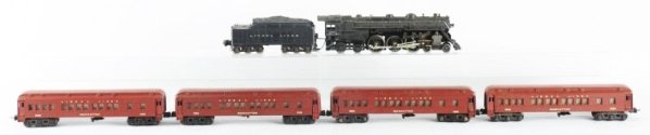 Lionel No.763 Engine with 6 Cars & Display Track.: Black No.763E Steam locomotive and tender. Has a repaired pilot. Otherwise complete and all original. No.2226W whistle tender complete and all original one rear step is slightly bent. No.2623 Manhatta