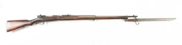 Japanese Arisaka Rifle**.: Serial No.000124870, barrel length 32". Bolt action. Stock has heavy handling marks. Freckles of rust on metal . Butt stock has a crack running from butt plate to grip. Condition (Poor).