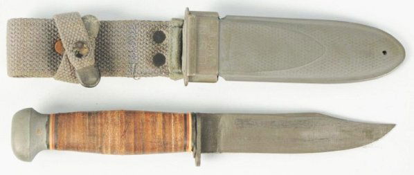 Mark 1 US Navy Knife.: US Navy issue Mark 1 or Model 23 belt knife complete with issue scabbard in very good-fine condition. World War II US Navy issue manufactured by Pal Blade Co with parkerized finish. Nice condition Wor
