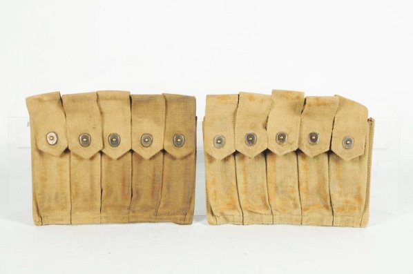 Web Magazine Pouches.: Two World War II period web magazine pouches for Thompson or M3 submachine gun magazines in fair-very good condition.
