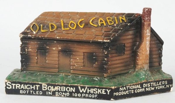 Old Log Cabin Whiskey Advertising Figure.: This chalk advertising figure has moderate overall chipping. Condition (Very Good). Size 12" L.