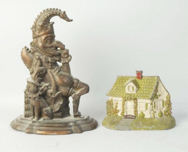 Lot of 2: Cast Iron Punch and Cottage Doorstops.: Punch - English. Copper electroplated over cast iron; Cottage - Made by Hubley and National Foundry. Condition (Very Good - Excellent). Size Largest: 12" T.