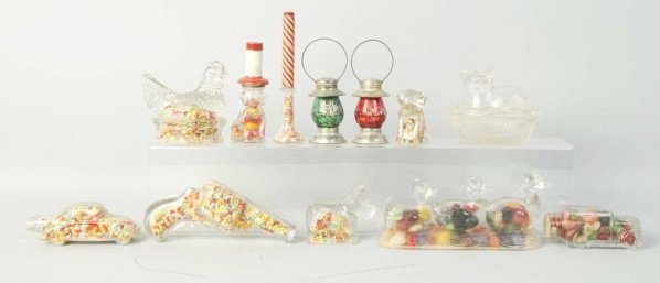 Lot of 13: Glass Candy Containers.: Three deer, two lanterns, horn, two cars, three dogs, cat on nest and gun. No damage or repairs. Condition (Excellent). Size Largest: 9" L.