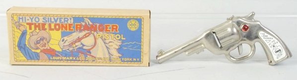 Lone Ranger Clicker Gun.: Gun (Mint). Box (Excellent). Size Largest: 8 - 3/4" L.