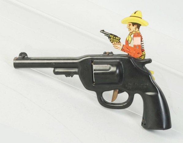 Wyandotte Cap Gun.: Me and My Buddy tin toy gun. Like new. When trigger is pulled he moves his gun forward. Clicker works well. Condition (Near Mint - Mint). Size 8 - 1/2" L.