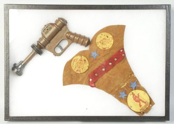 Buck Rogers Disintegrator Gun with Holster.: Gun pops well. Has light wear and some spotting. Holster is well worn but has the three patches complete. Gun (Very Good Plus). Holster (Fair - Good). Size Largest: 11 - 1/2" L.