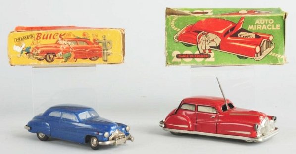 Lot of 2: European Automobile Toys.: Includes a French Auto Miracle car with opening door which has a partial original box, and a German Prameta Buick with a partial original box with the original key. Condition (Very Good). Size Largest