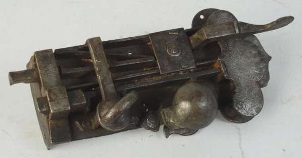 Early Hand Wrought Door Lock.: Circa early 1800s. With scroll decoration. Condition (Excellent). Size 11" L.