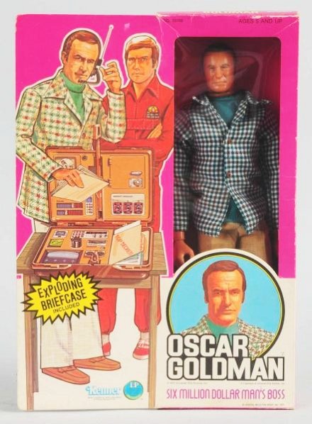 Oscar Goldman Six Million Dollar Man Boss Doll.: Made by Kener. Includes the exploding briefcase. Dated 1976, box is nice but does have some creasing in upper left corner. Condition (Very Good - Excellent). Size 14" L.