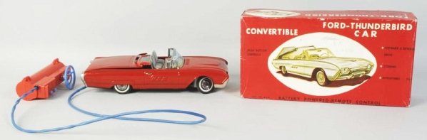 Japanese Tin Batt. Op. Ford Thunderbird Car.: Convertible with retractable roof. Includes original box. Some writing on the box and some creasing. Also has remote control, tin car, plastic remote. Condition (Very Good - Excellent). Size Box: 12" 