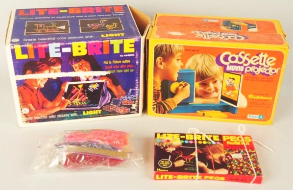 Lot of 2: Vintage American Made Toys.: Both toys in original boxes. One is a Hasbro Lite-Brite. The other is a Kenner Cassette Movie Projector (The Flinstones). Includes some extra Lite-Brite pegs. Items look slightly used. Condition (Very