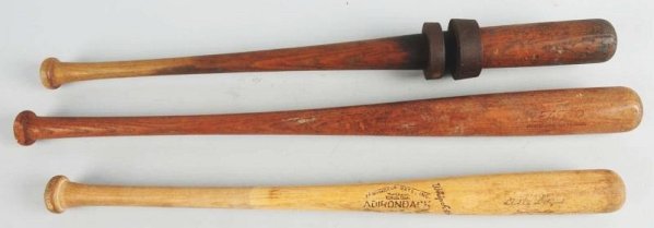 Lot of 3: Vintage Baseball Bats.: One is a Duke Snider model, one a Little League model and one is a generic bat but has two vintage iron doughnuts on it. Condition (Very Good). Size Largest: 33 - 3/4" L.