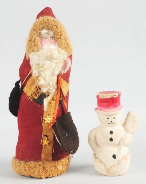 Pair of Christmas Decorations.: Santa soft body and face. Paper mache snowman with stains. Condition (Excellent). Size Largest: 14 - 1/4" T.