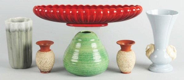 Lot of 5: Art Pottery.: Pair German vases, fluted vases. Green vase with swans. No damage and red banana bowl by Freeman and McFarlin. California. Condition (Excellent). Size Largest: 20" L.
