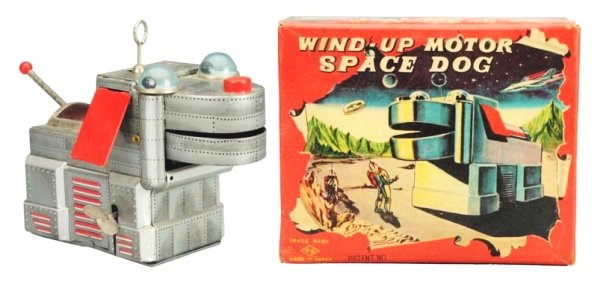 Tin Litho Wind-up Space Dog.: Made in Japan by Yoshia. Working. Includes original box. Some light scratches throughout. Some tape residue to the bottom of the base of the toy. Box has some minor creases and fading to one end panel