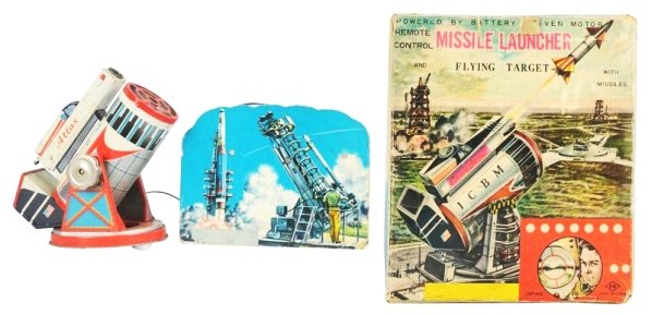Tin Litho ICBM Missle Launcher.: Battery operated. Made in Japan by Horikawa. Working. Includes original box. Toy could clean to a better grade. Scratches throughout and some minor crazing. Small dent to the blower. Box has some dark