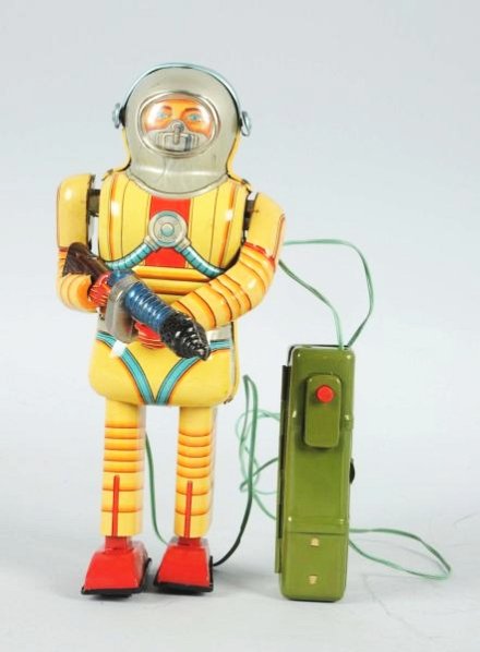 Tin Litho Earth Man Battery Operated.: Made in Japan by Nomura. Working. Has a very minor spot on one arm and some light scratching throughout. Toy (Excellent). Size 8 - 1/2" T.