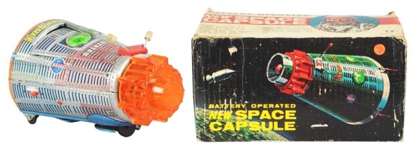 Tin Litho & Painted New Space Capsule.: Battery operated. Made in Japan by Horikawa. Working. Includes original box. Two tips on the antennas are replacements. Some heavy crazing to the bottom of the toy and some oxidation on the inside of 