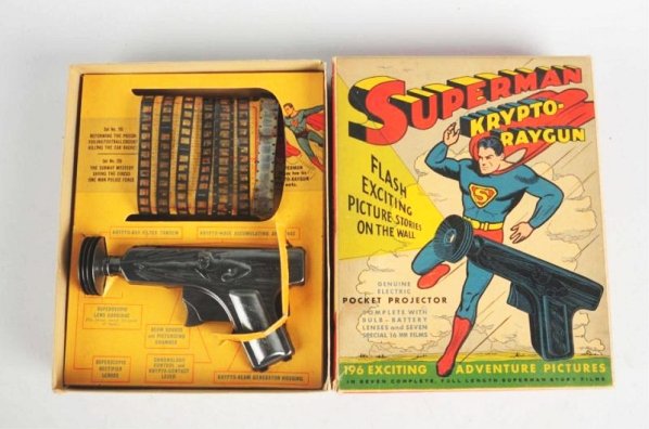 Daisy Superman Krypto - Ray Gun.: Includes very colorful, original box depicting Superman on the front. Has film strips and box insert. Also includes very difficult to find Daisy toys catalog showing various guns for sale. Some minor 