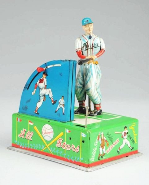 Japanese Battery Op. Baseball Player Toy.: Toy is all original. Very nice graphics of baseball players and Major League baseball teams around the base of the toy. Toy has slight play wear. Original balls included. Condition (Very Good - Excell