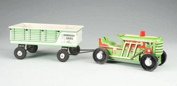 Marx Tin Wind-up Marbrook Farms Tractor Trailer.: Set appears to be new old stock condition. Unplayed with. Tractor has excellent graphics and litho. Complete in original box with original inserts. Condition (Near Mint). Size 17" L.