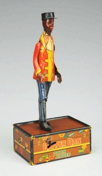 Marx Tin Wind-up Dapper Dan Coon Jigger Toy.: All original including original arms does have some scratching to base and to figure where arms meet. Condition (Very Good). Size 10" T.