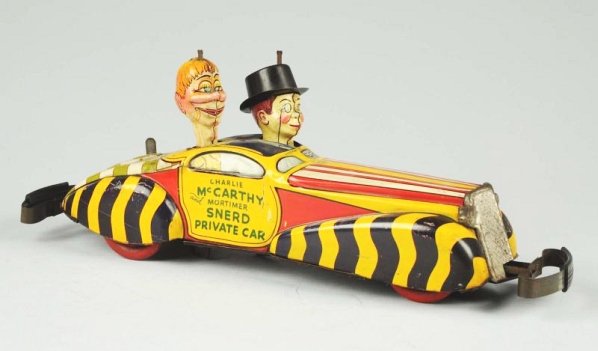 Marx Tin Charlie McCarthy & Mortimer Snerd Car.: Includes original front and back rear bumpers. When in operation, heads spin. Original hat. The car has some scratching and scuffing throughout. Marked "1939 McCarthy Inc." on the side. Condition (Ver