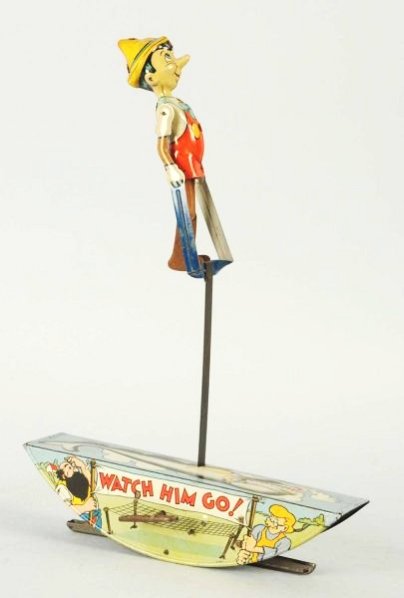 Marx Pinocchio The Acrobat Toy.: All original has very nice litho of Pinocchio characters on the base dated 1939.Toy does have some fading and play wear. Condition (Very Good). Size 11 - 1/4" L.