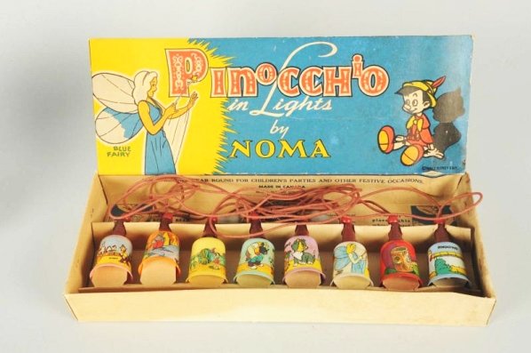 Set of Noma Pinocchio Christmas Lights in Box.: Original box. Excellent graphics and box has very nice graphics. Some creasing to box. Condition (Excellent). Size Box: 16 - 1/2" x 6 - 1/4".
