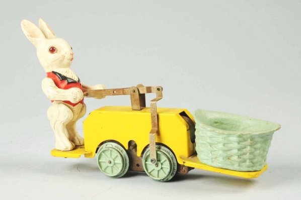 Lionel Peter Rabbit Chick-Mobile Hand Car Toy.: Winds with a key. Track version does not include track. Has original eyes. Some minor chipping to rabbit and wear to basket and some slight oxidation on bare metal parts. Could clean to a better grade