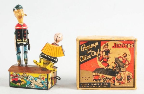 Marx Tin Wind-up Popeye & Olive Oil Jigger Toy.: All original including Popeyes arms and pips. Does have slight play wear. Still very bright with nice color. Comes with original box. Box has some creasing and tape to flaps. Condition (Excellent). Si