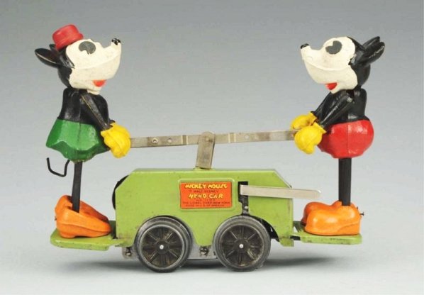 Lionel Mickey Mouse Hand Car.: Wind-up toy. Scarce green version. Comes with original Mickey and Minnie Mouse figures. Does need some restoration. Original box, inserts and track. Condition (Very Good). Size Box: