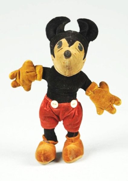 German Steiff Mickey Mouse Doll.: Smaller sized. Looks to have original ears. Some soiling to hands, feet, and face. Red shorts version. Doll is pie eyed. Missing tail and whiskers. Condition (Very Good). Size 6 - 1/2" T.