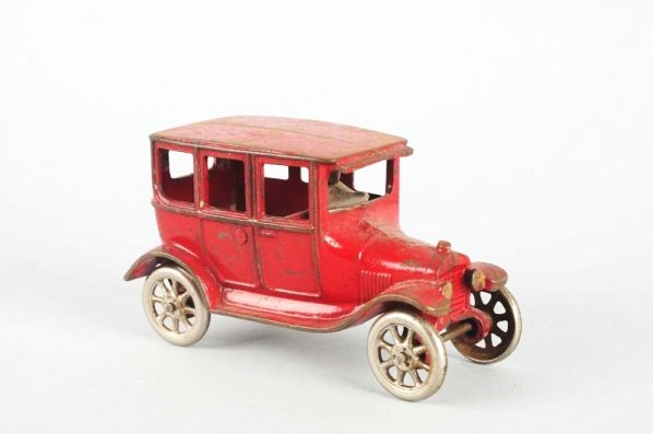 Cast Iron Arcade Red Model T Sedan.: Original figure. Condition (Good - Very Good). Size 6 - 1/2" L.